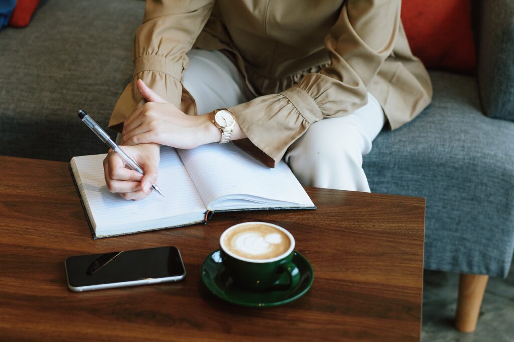 woman, writing, table-7520626.jpg